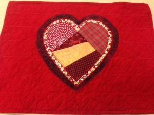 Heart applique. Make this into a pillow, a placemat, a tote, a pajama bag for the little person in your life, or a table runner as per the instructions. 