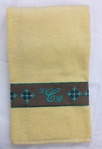 Added decorative band features monograms, piping, and little designs.